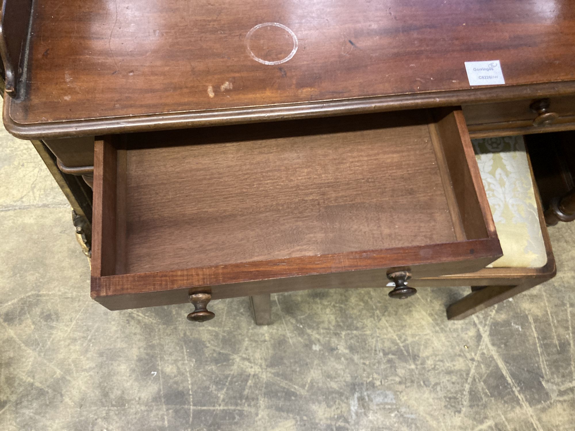 A Victorian mahogany washstand, width 106cm, depth 54cm, height 79cm, together with a mahogany toilet mirror and a stool (3)